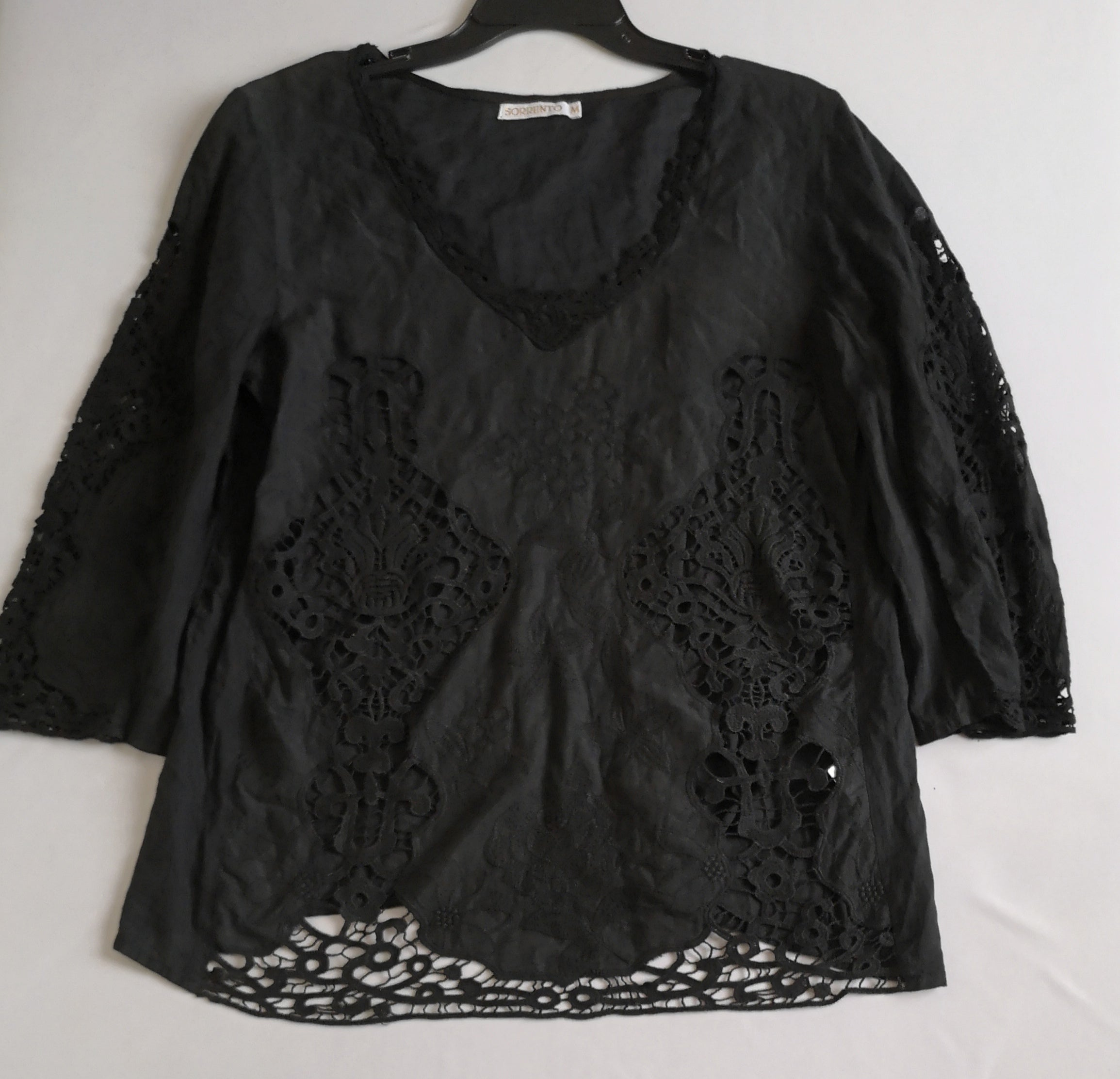 Palazzo corrugado con blusa bordada