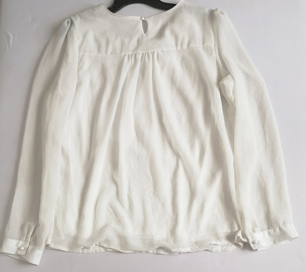 Blusa con adorno adelante y falda midi de algodón
