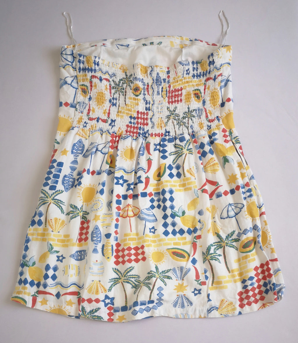 Vestido strapless con bolsas a los lados ⚓