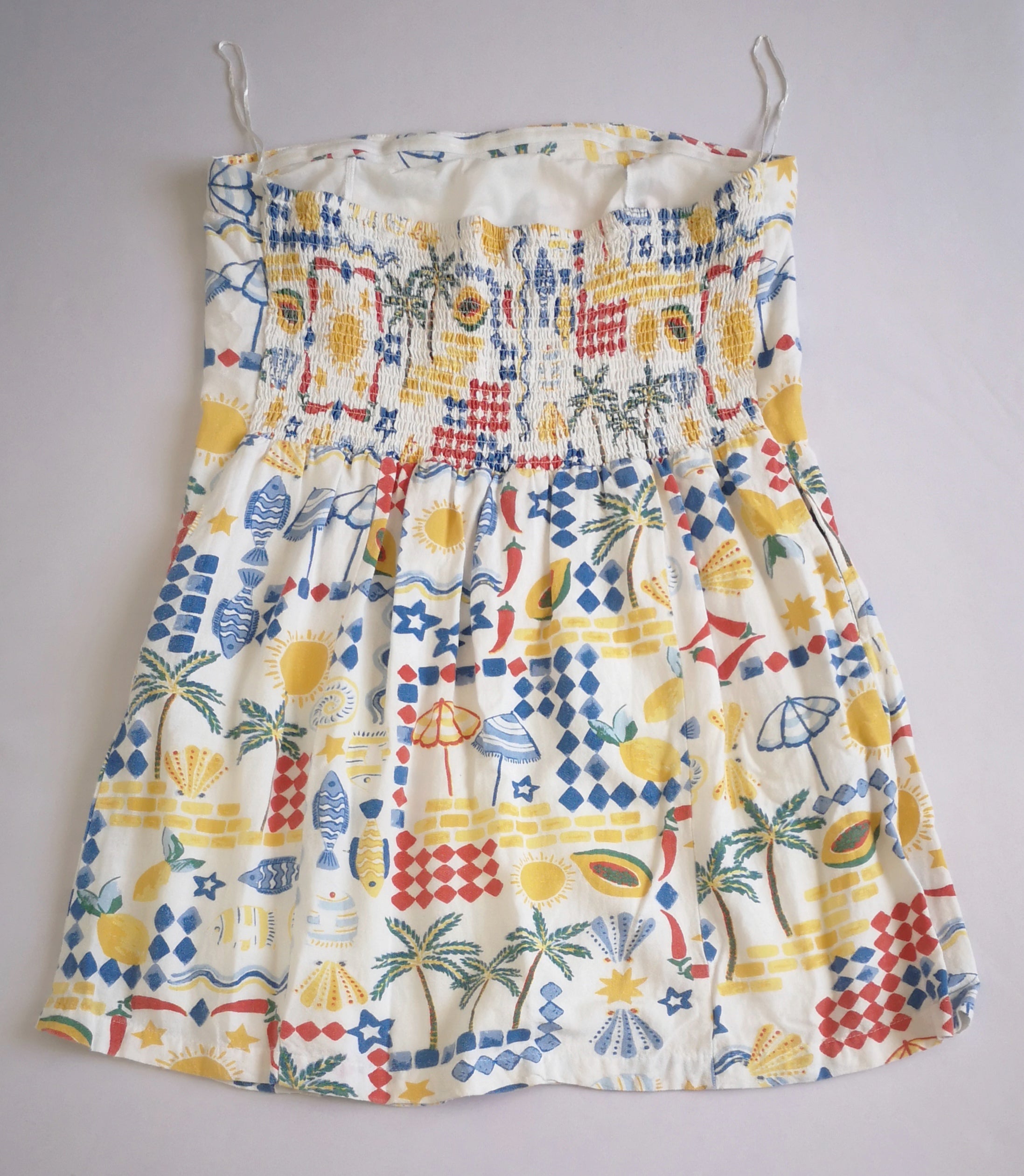 Vestido strapless con bolsas a los lados ⚓