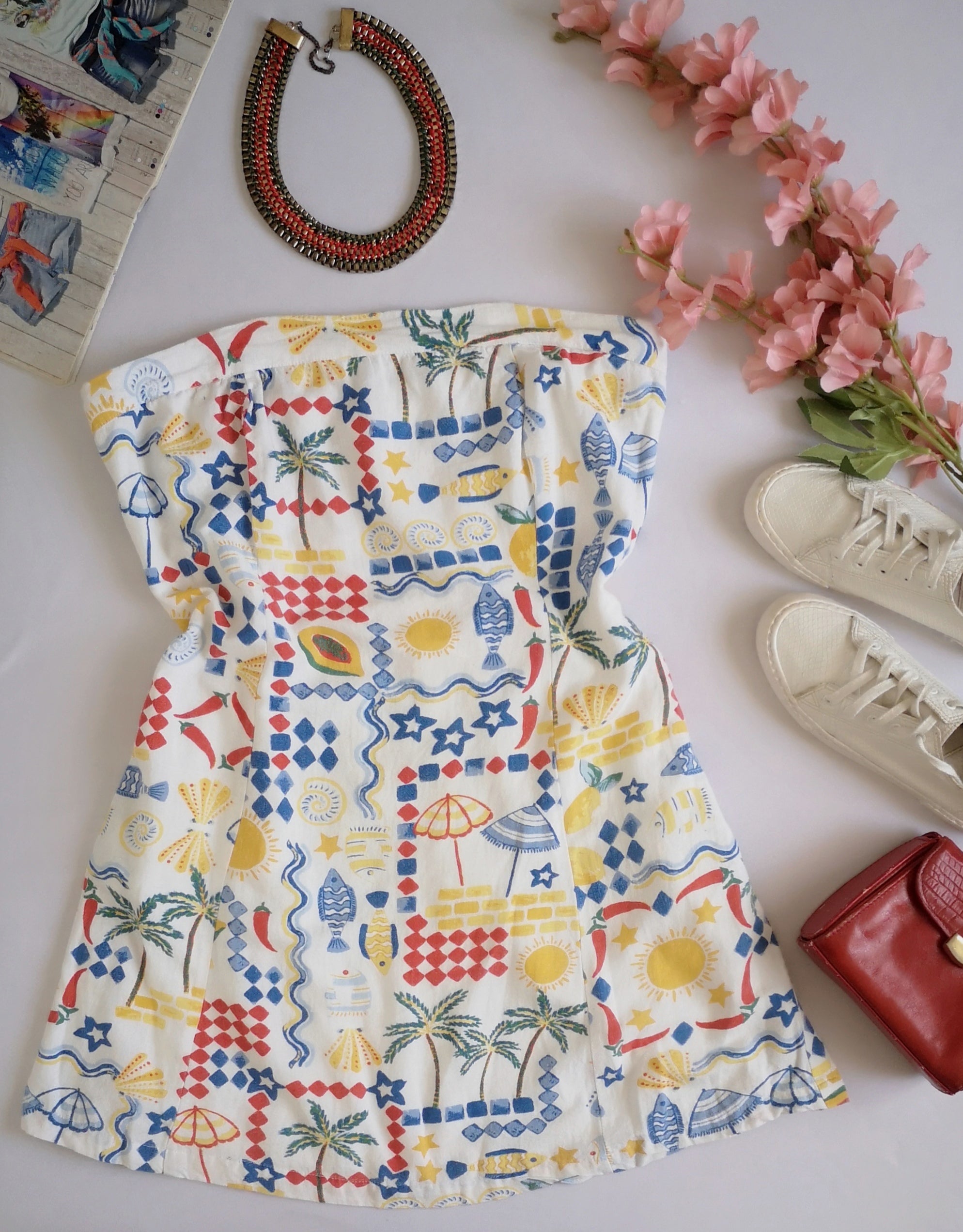 Vestido strapless con bolsas a los lados ⚓