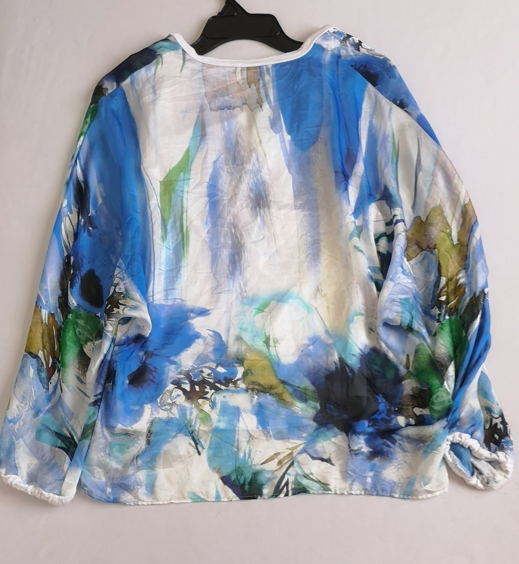 Blusa tipo seda