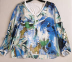 Blusa tipo seda