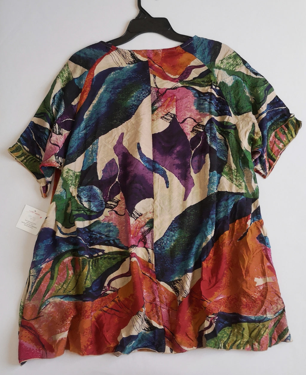 Blusa larga nueva con bolsas a los lados