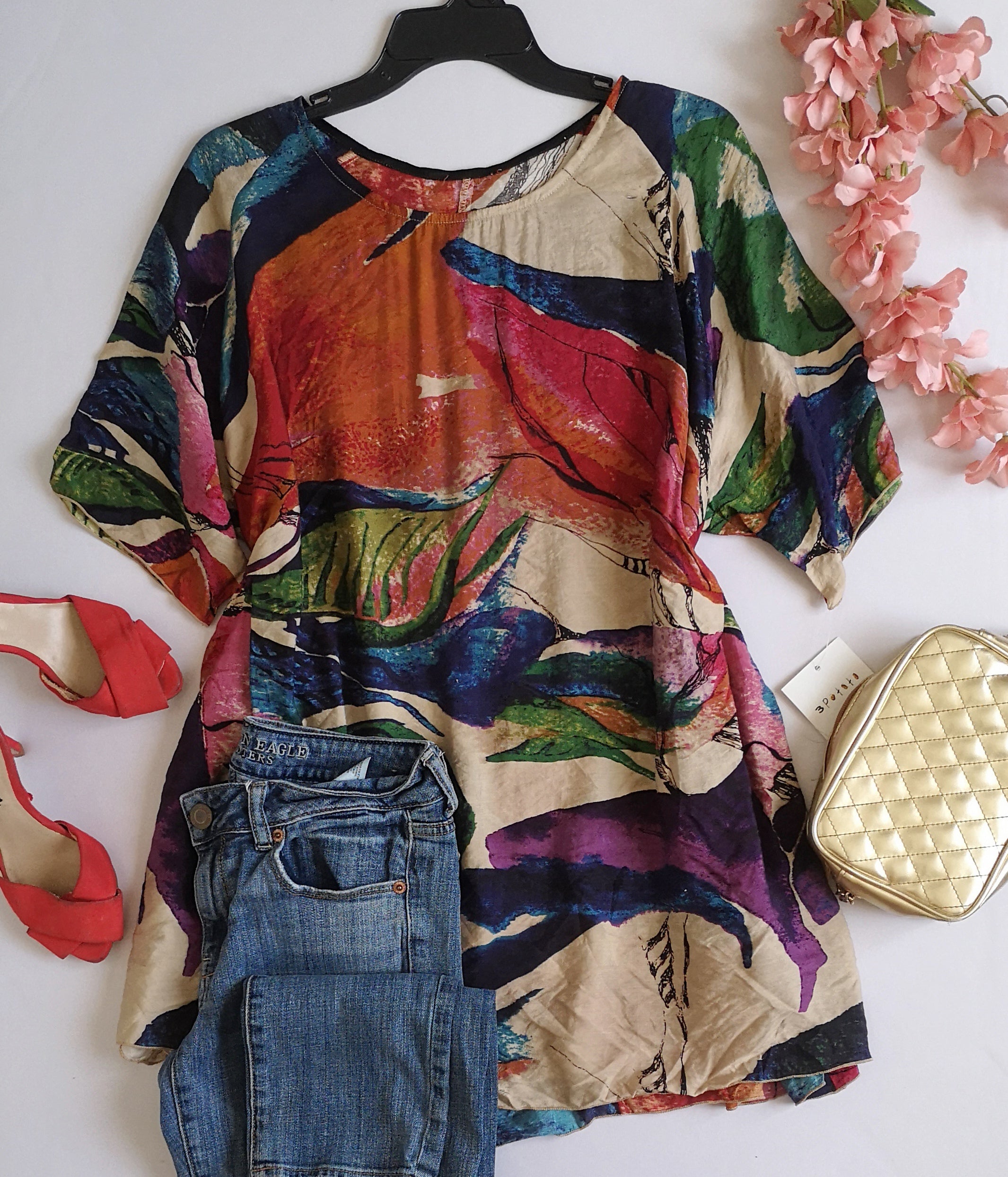 Blusa larga nueva con bolsas a los lados