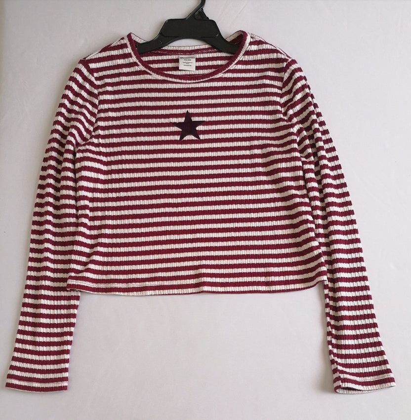 Blusa corta con jeans rasgado cintura alta