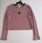 Blusa corta con jeans rasgado cintura alta