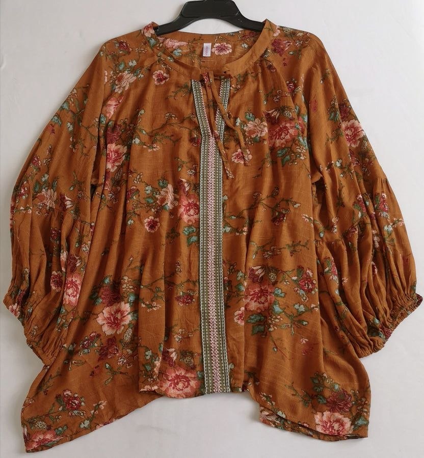 Blusa tipo boho con jeans