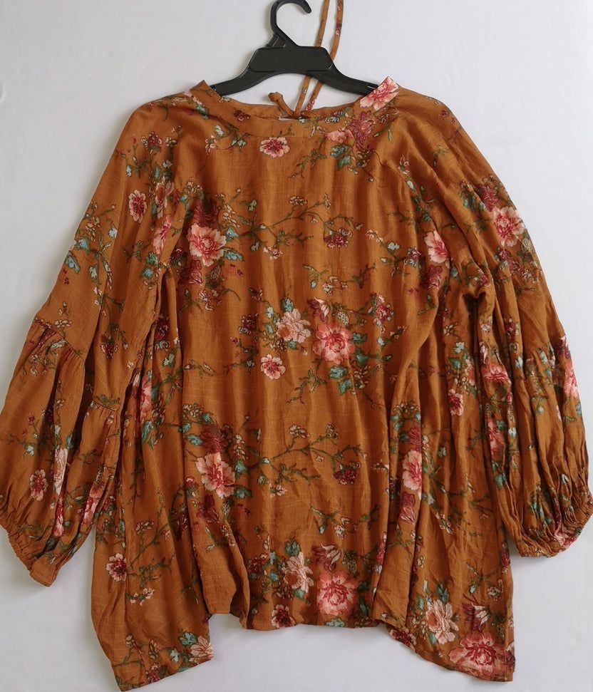 Blusa tipo boho con jeans