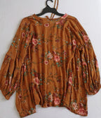 Blusa tipo boho con jeans