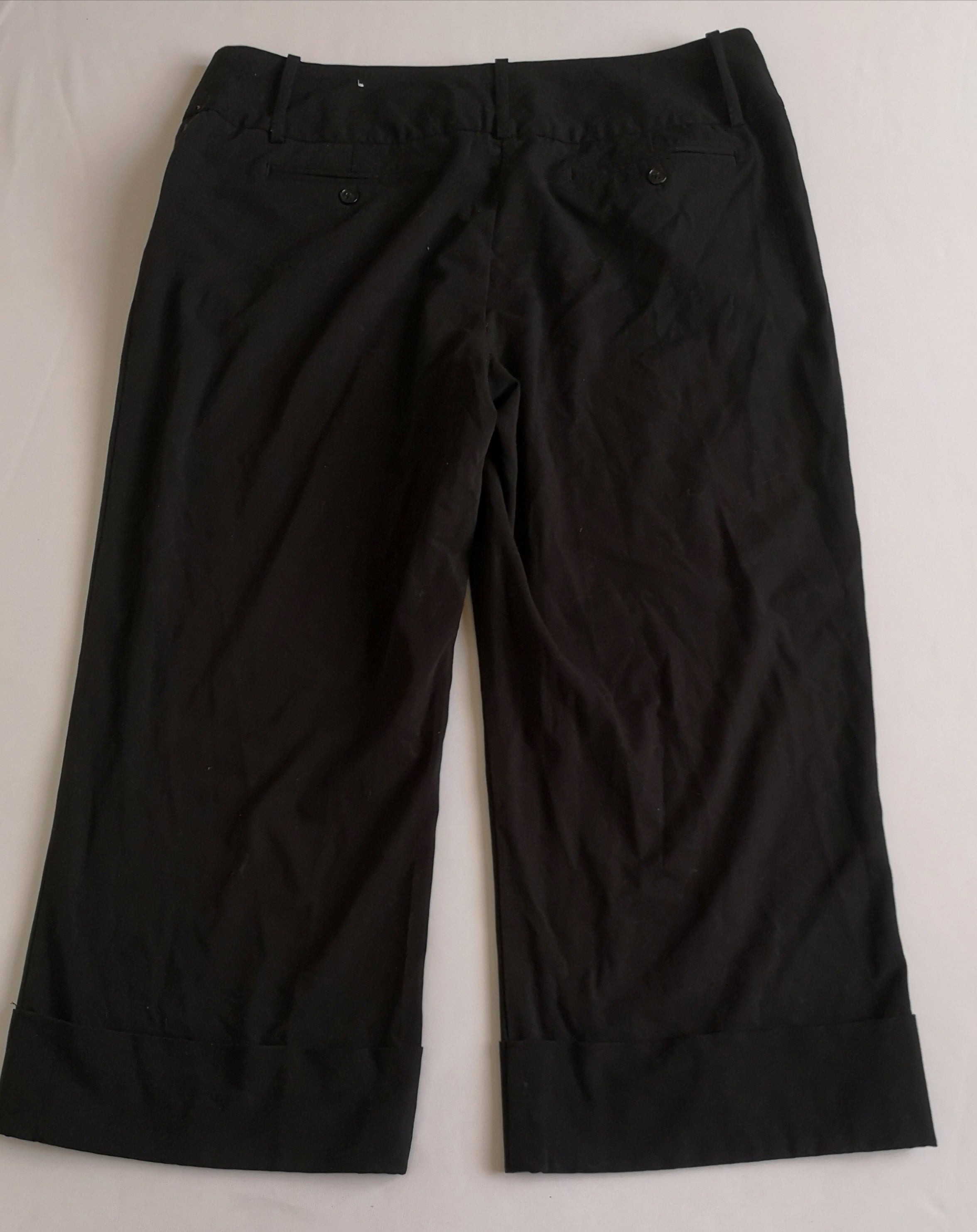 Pantalón tipo Culotte y blusa traslapada cerrada