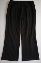 Blusa con cinto atrás y pantalón corte recto