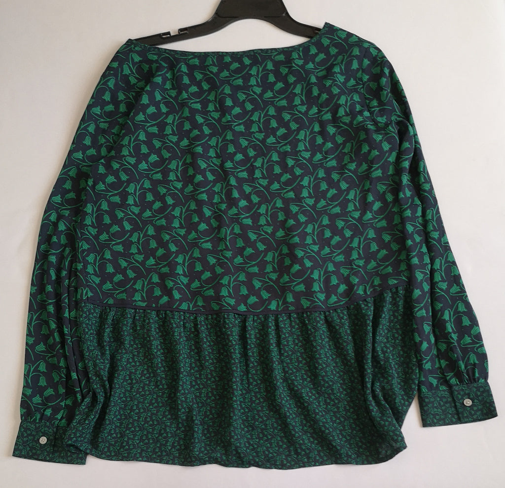 Blusa manga larga incluye collar