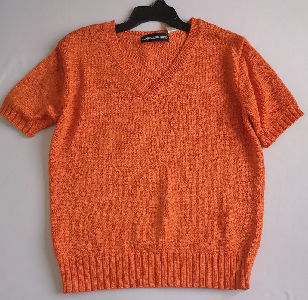 Blusa tejida con pantalón Campana