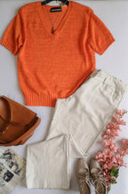 Blusa tejida con pantalón Campana