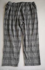 Pantalón ancho de las caderas y blusa larga