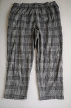 Pantalón ancho de las caderas y blusa larga