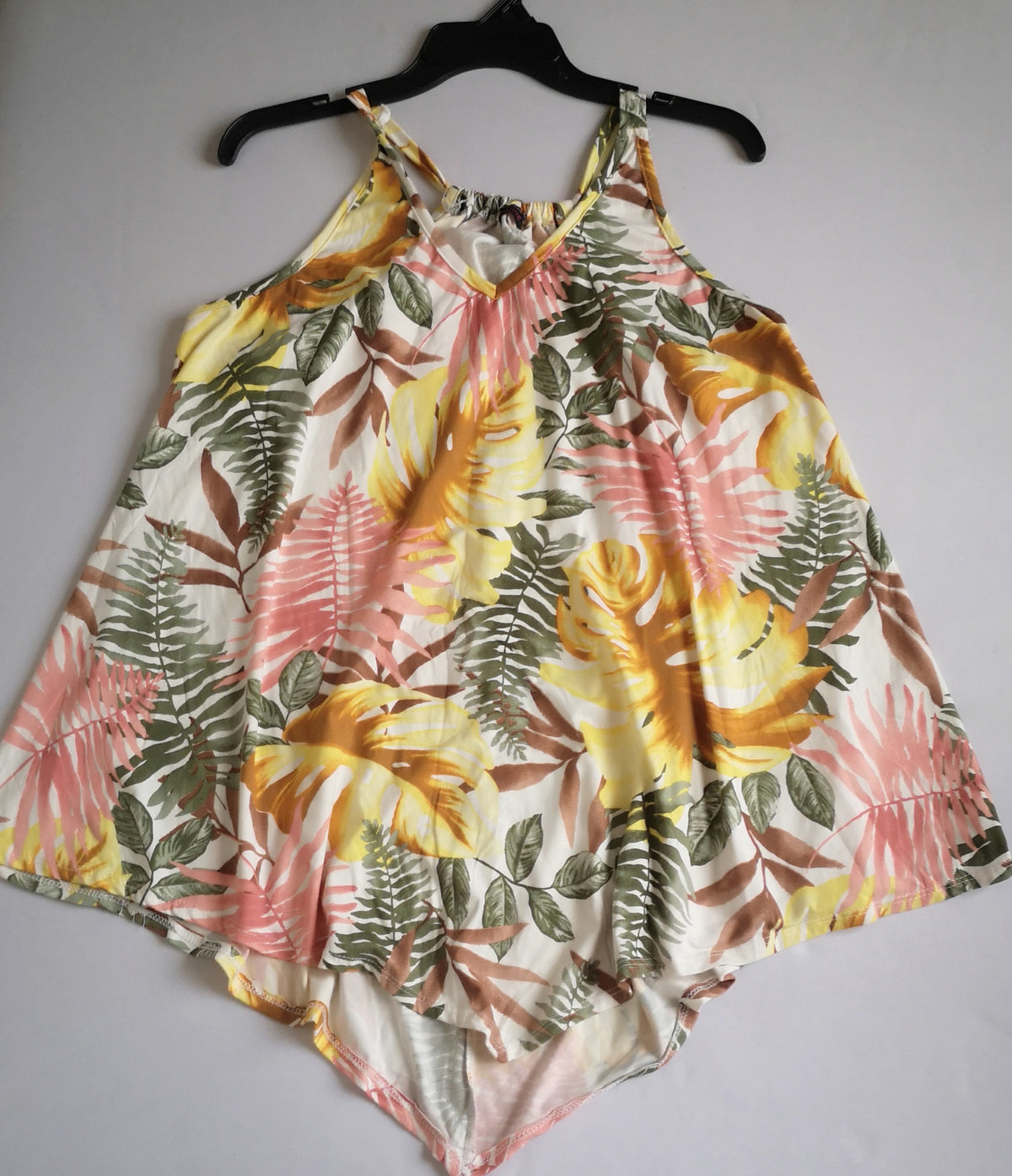 Pantalón con bolsas secretas y blusa asimétrica