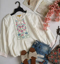 Blusa bordada incluye collar