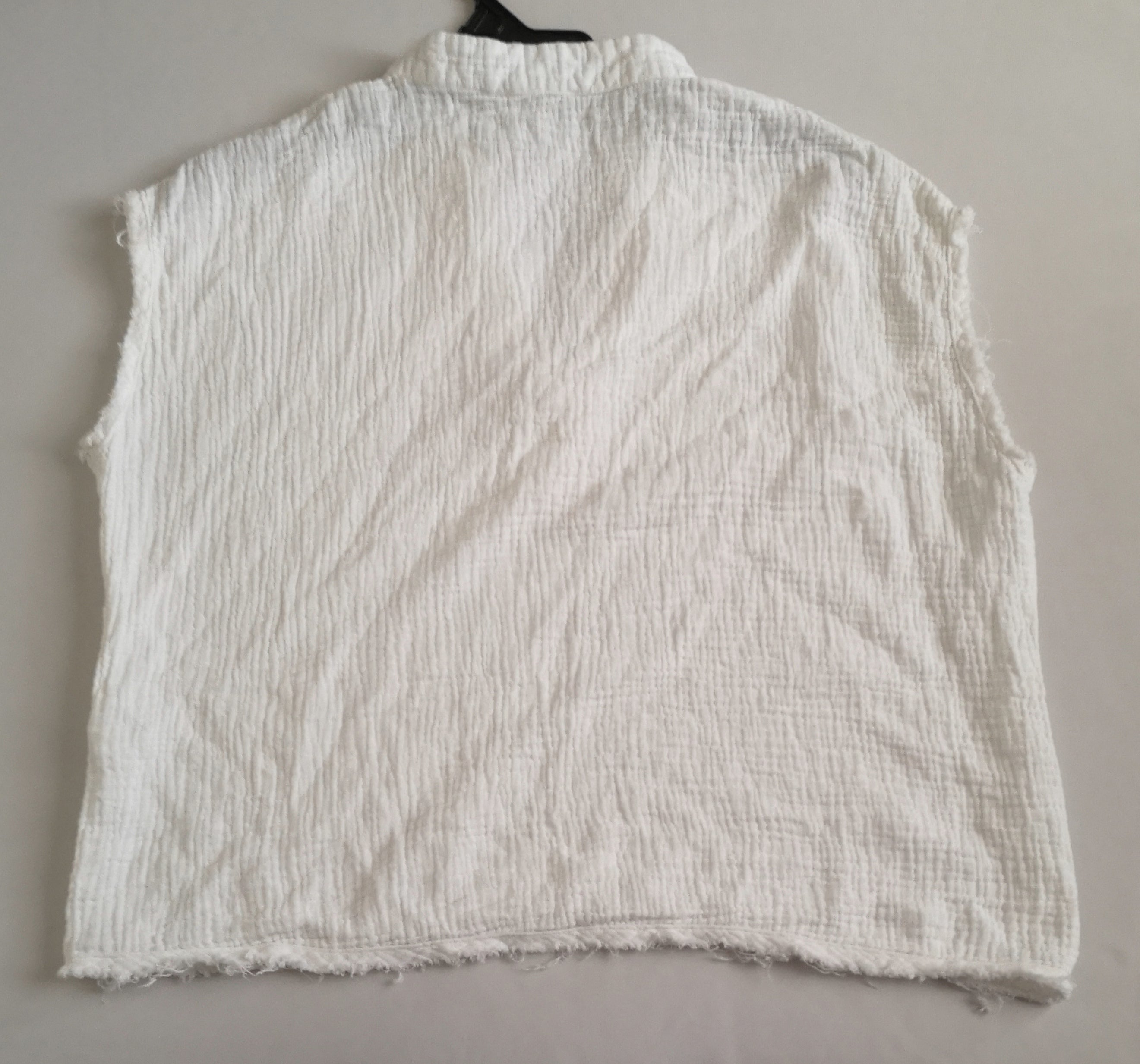 Blusa sin mangas y palazzo tela suave