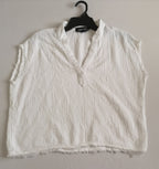 Blusa sin mangas y palazzo tela suave