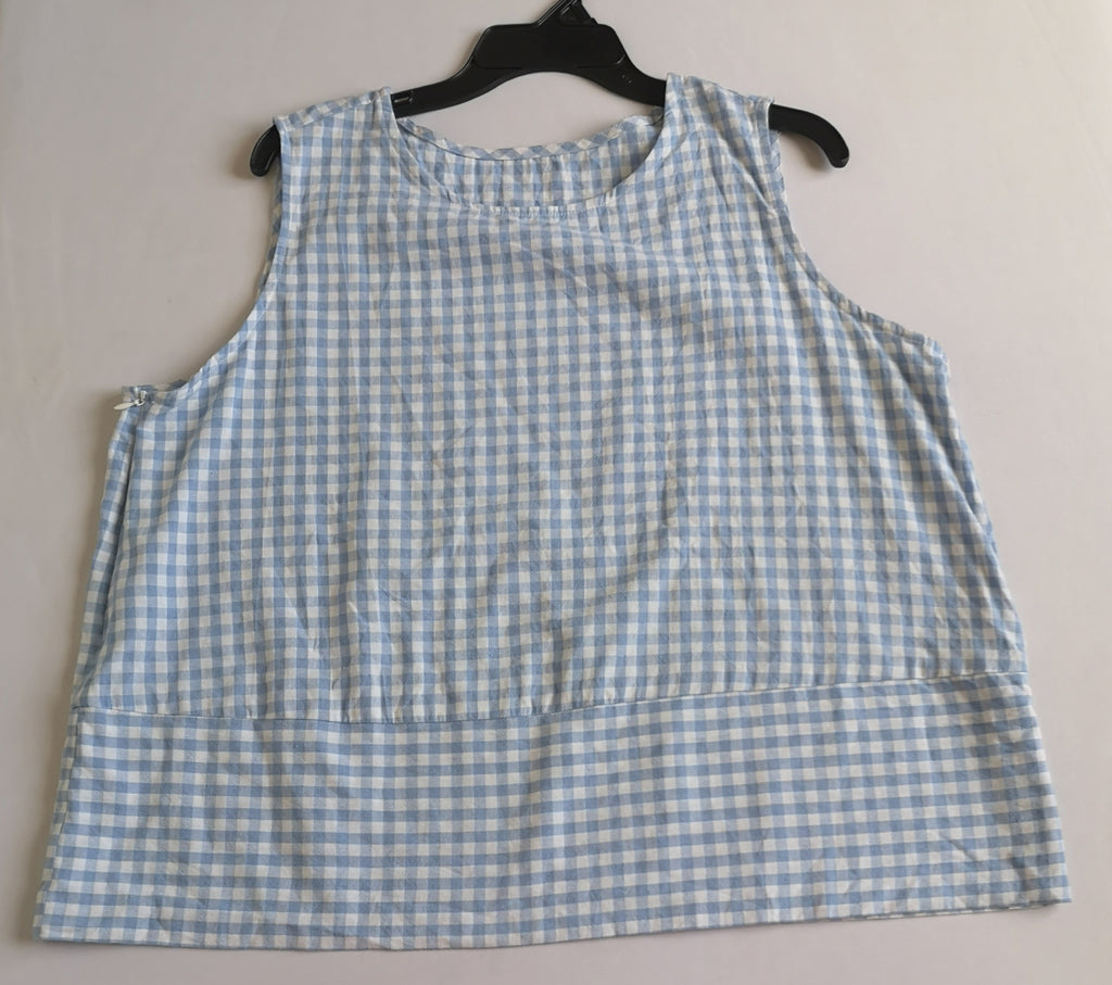 Falda abajo de la rodilla y blusa sin mangas ⚓