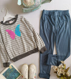 Pantalón y sueter con lentejuelas