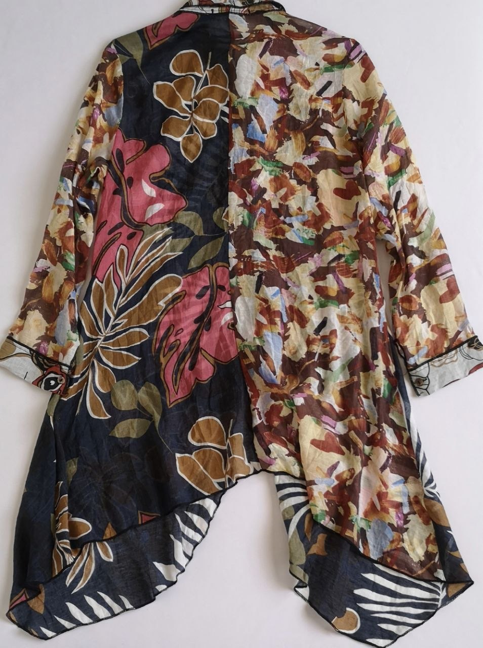 Blusa asimétrica incluye cincho