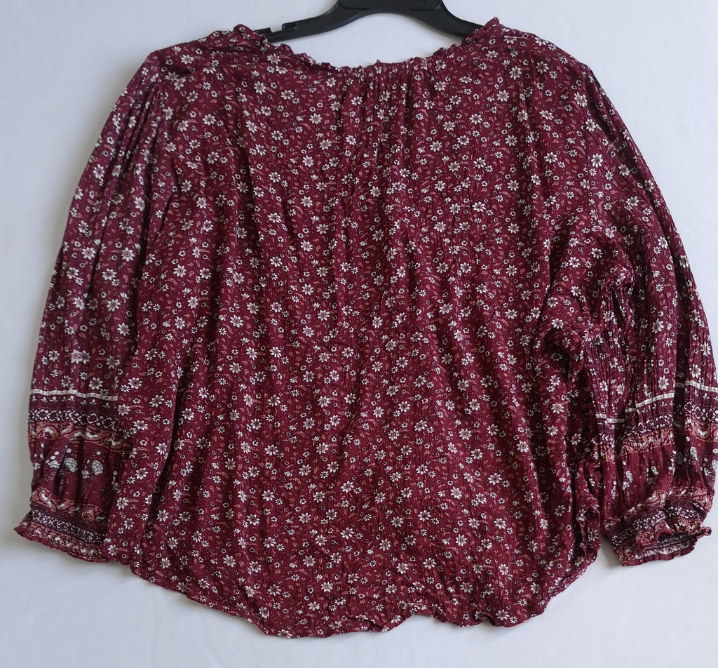 Blusa tela suave con jeans