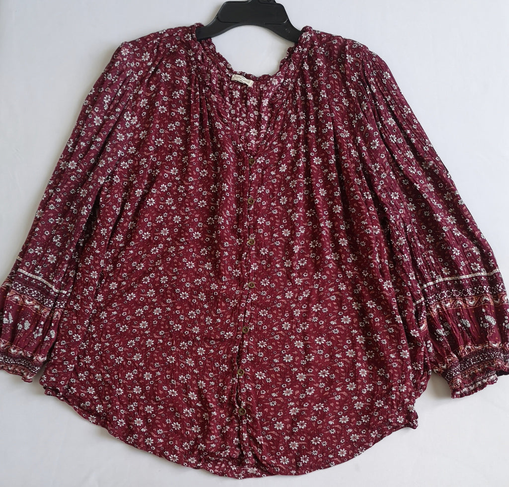 Blusa tela suave con jeans