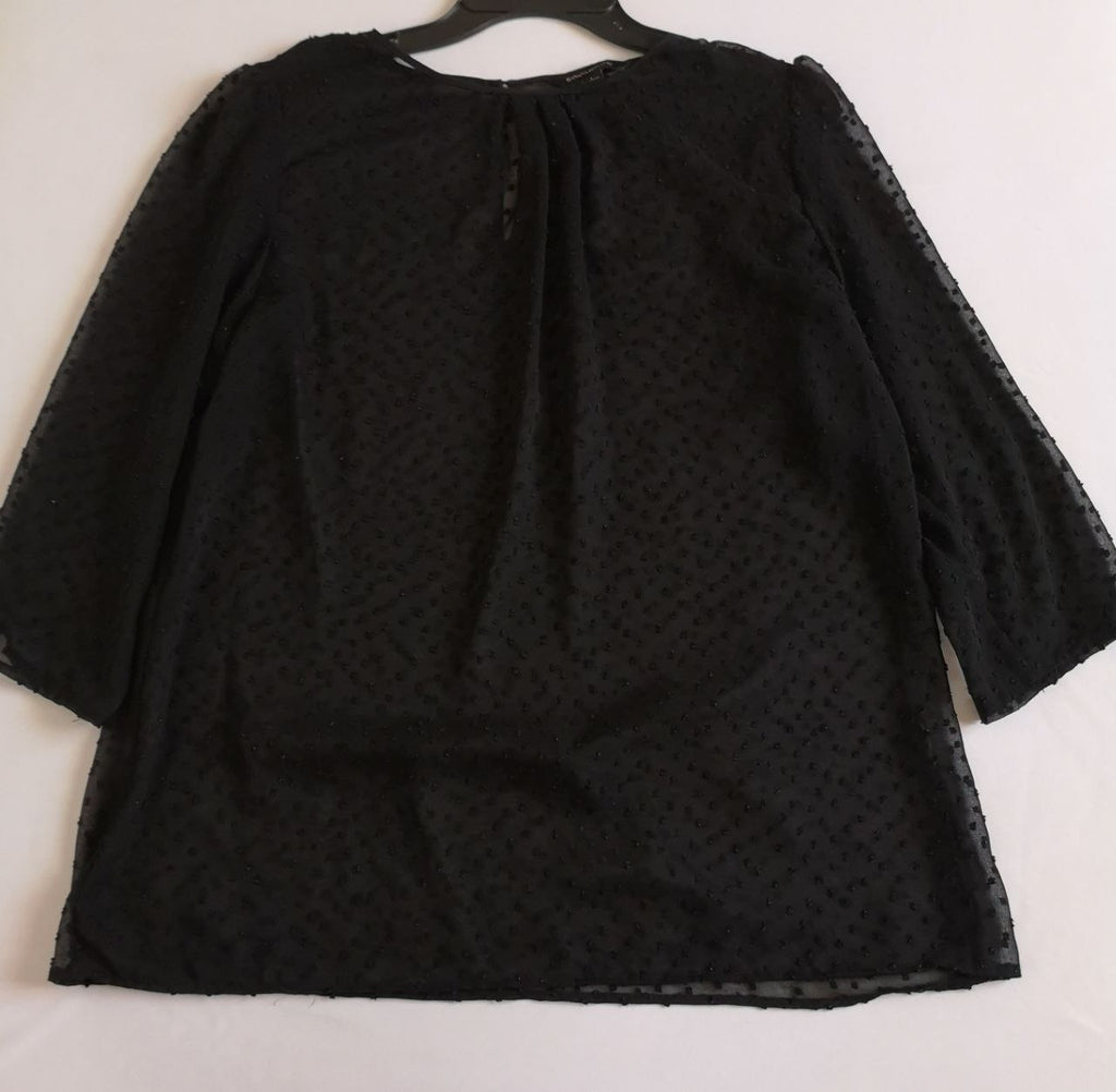 Pantalón de vestir con blusa de chifon