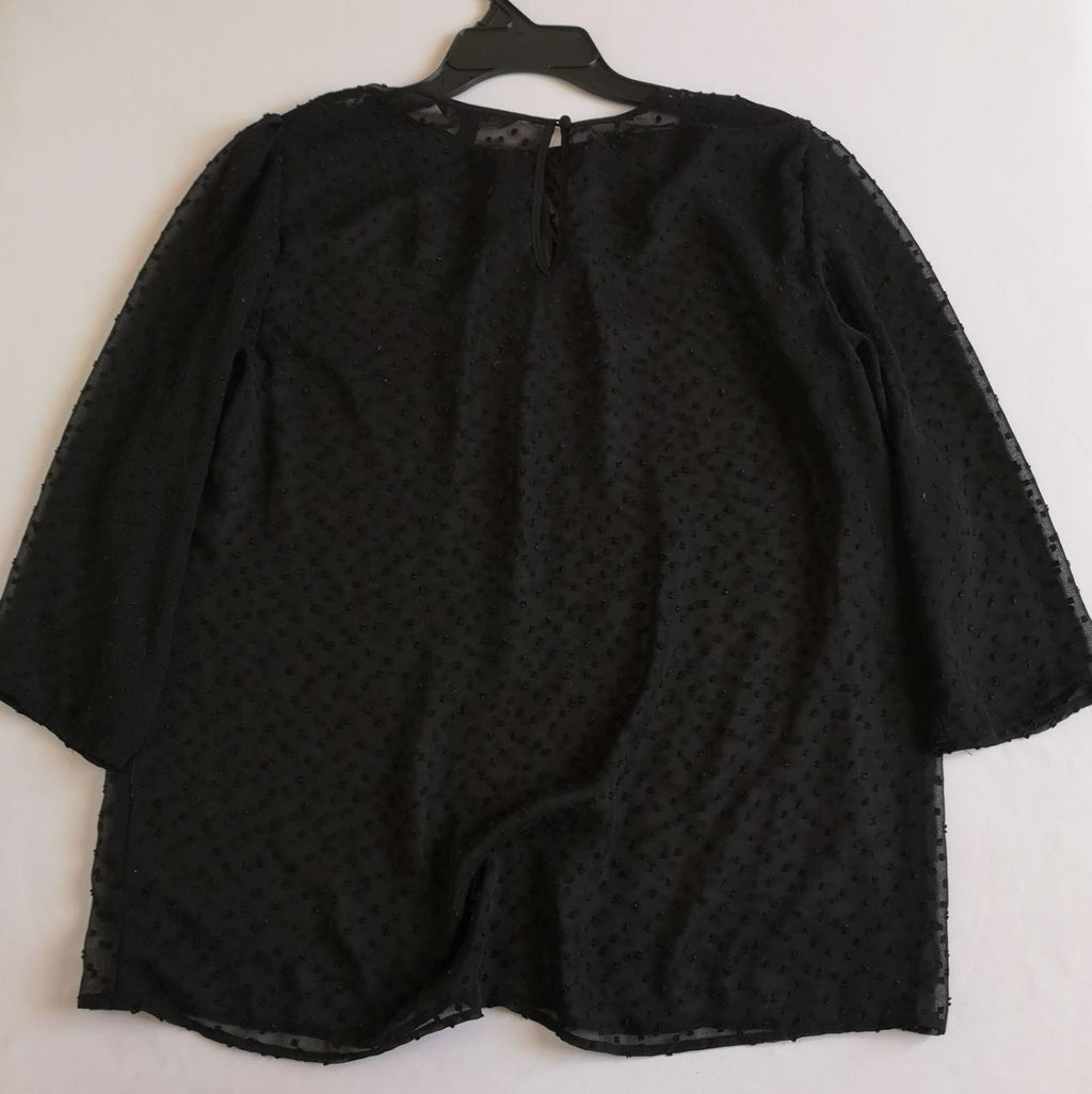 Pantalón de vestir con blusa de chifon