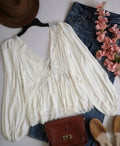 Blusa tipo peplum con encaje