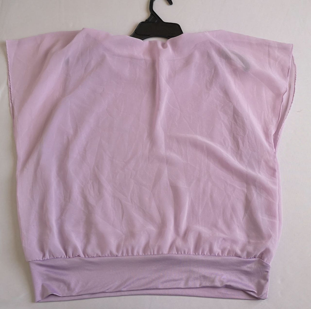 Jeans con blusa de chifón