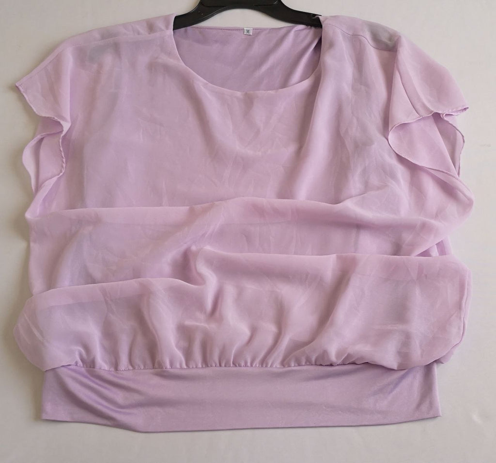 Jeans con blusa de chifón