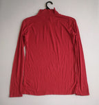 Chaleco acolchonado con blusa manga larga