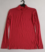 Chaleco acolchonado con blusa manga larga