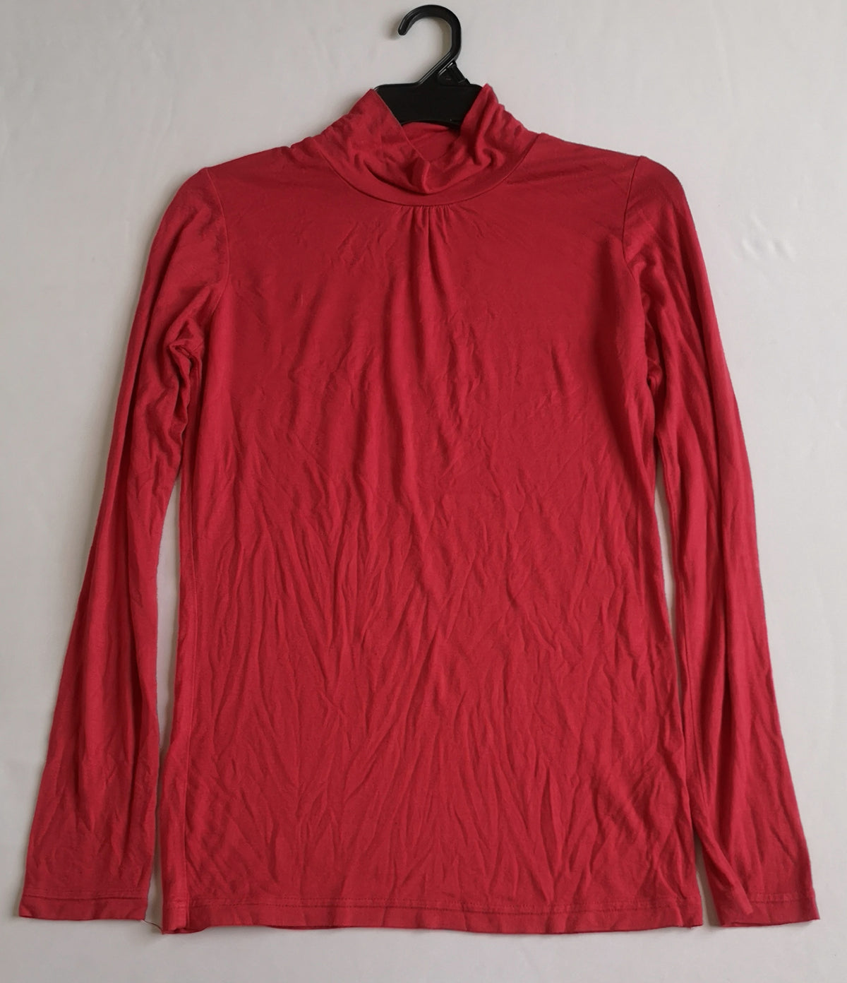 Chaleco acolchonado con blusa manga larga