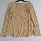 Jeans campana con blusa tallada