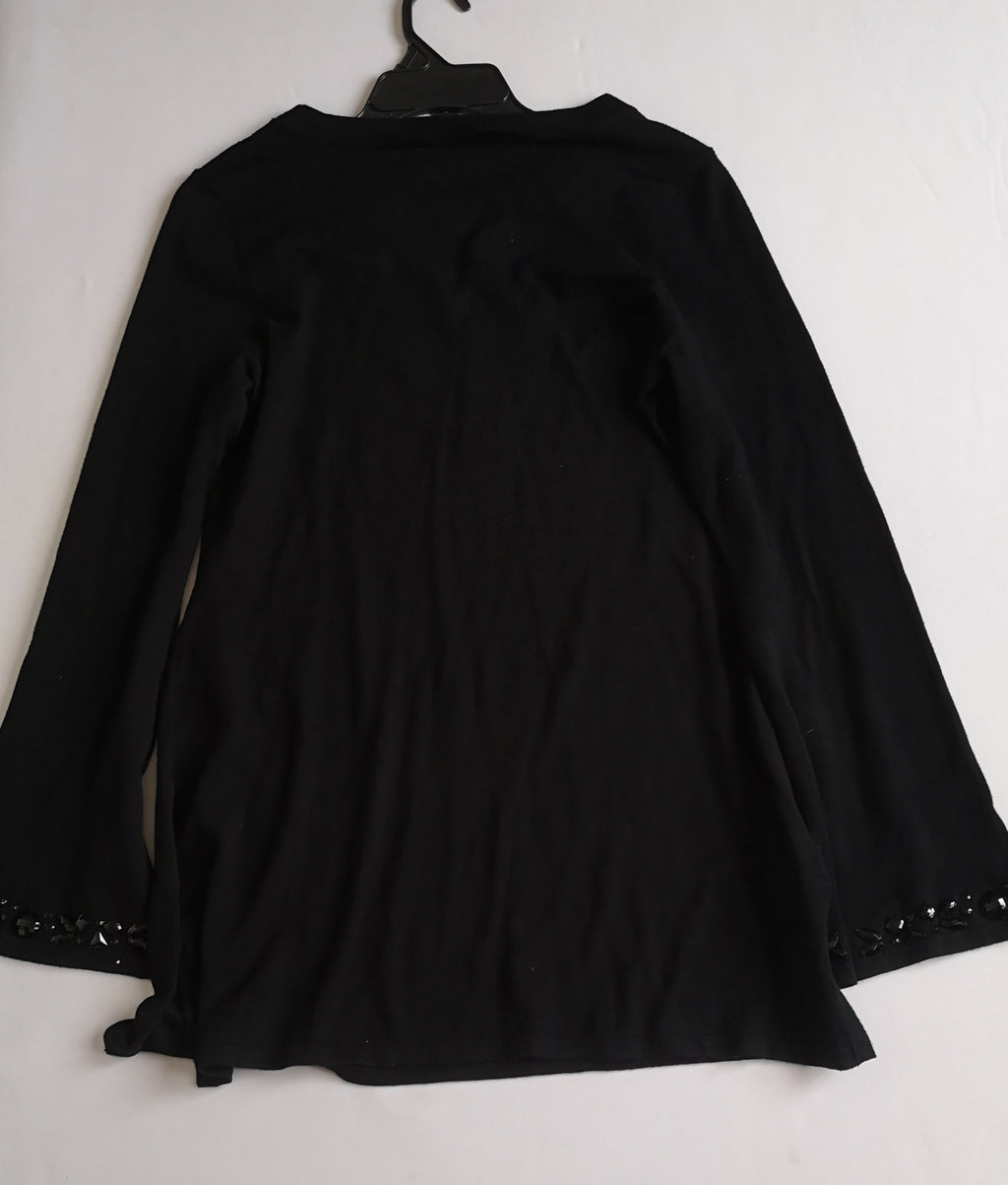 Blusa larga bordada
