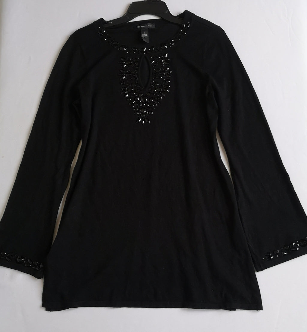 Blusa larga bordada