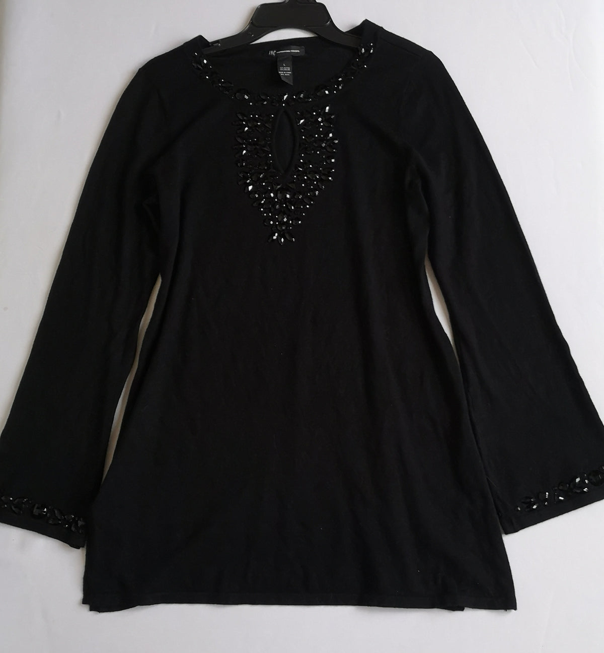 Blusa larga bordada