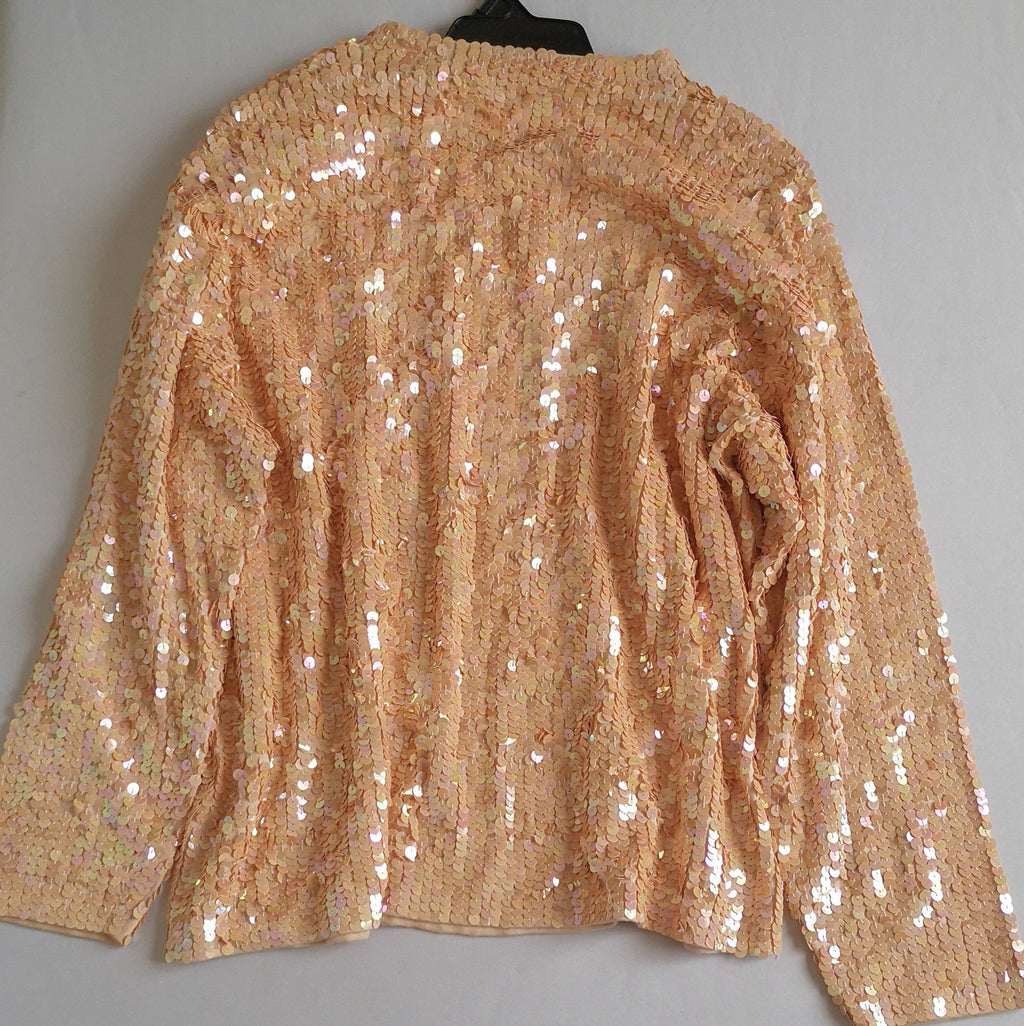 Blusa de lentejuelas incluye cartera
