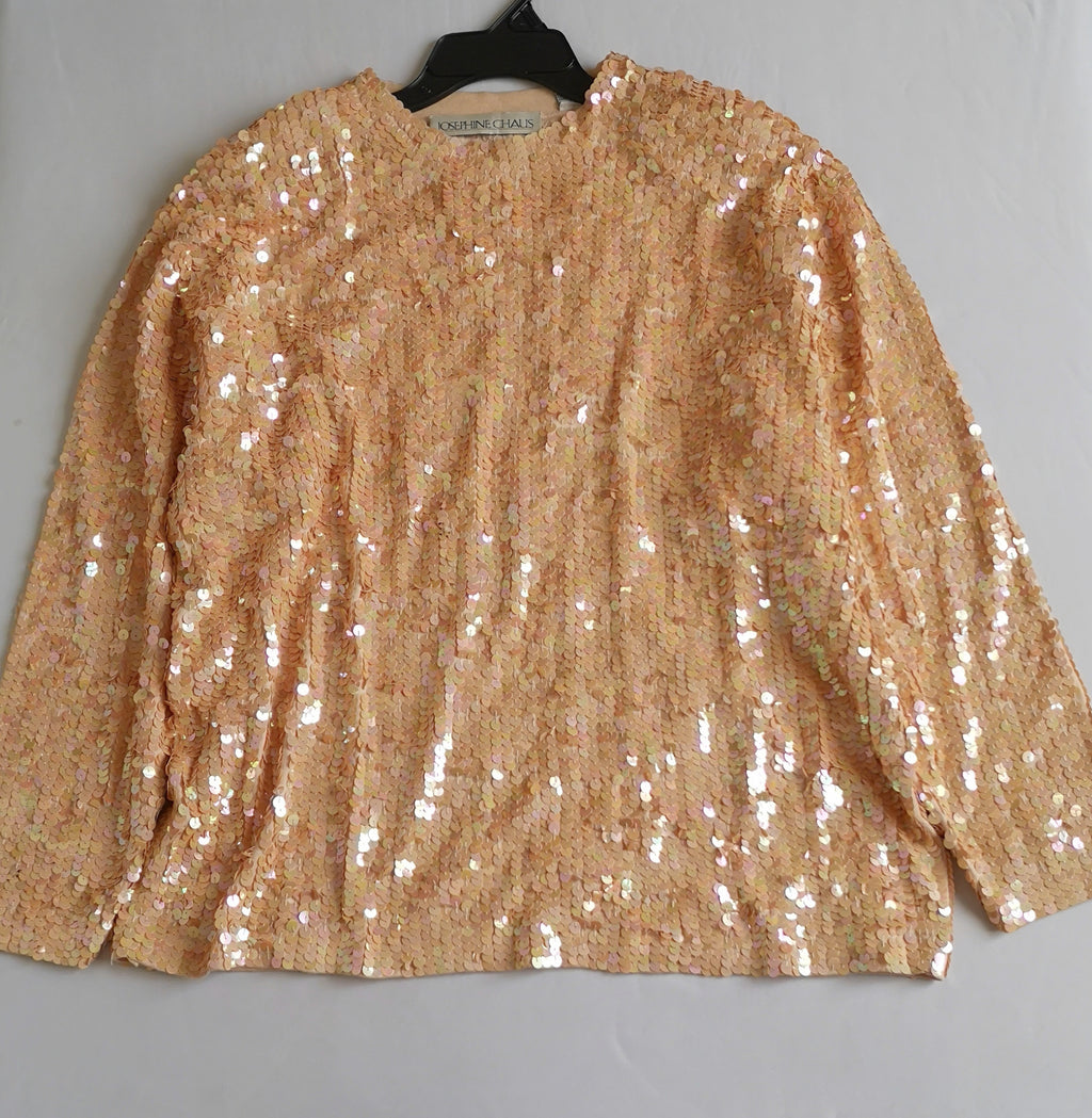 Blusa de lentejuelas incluye cartera