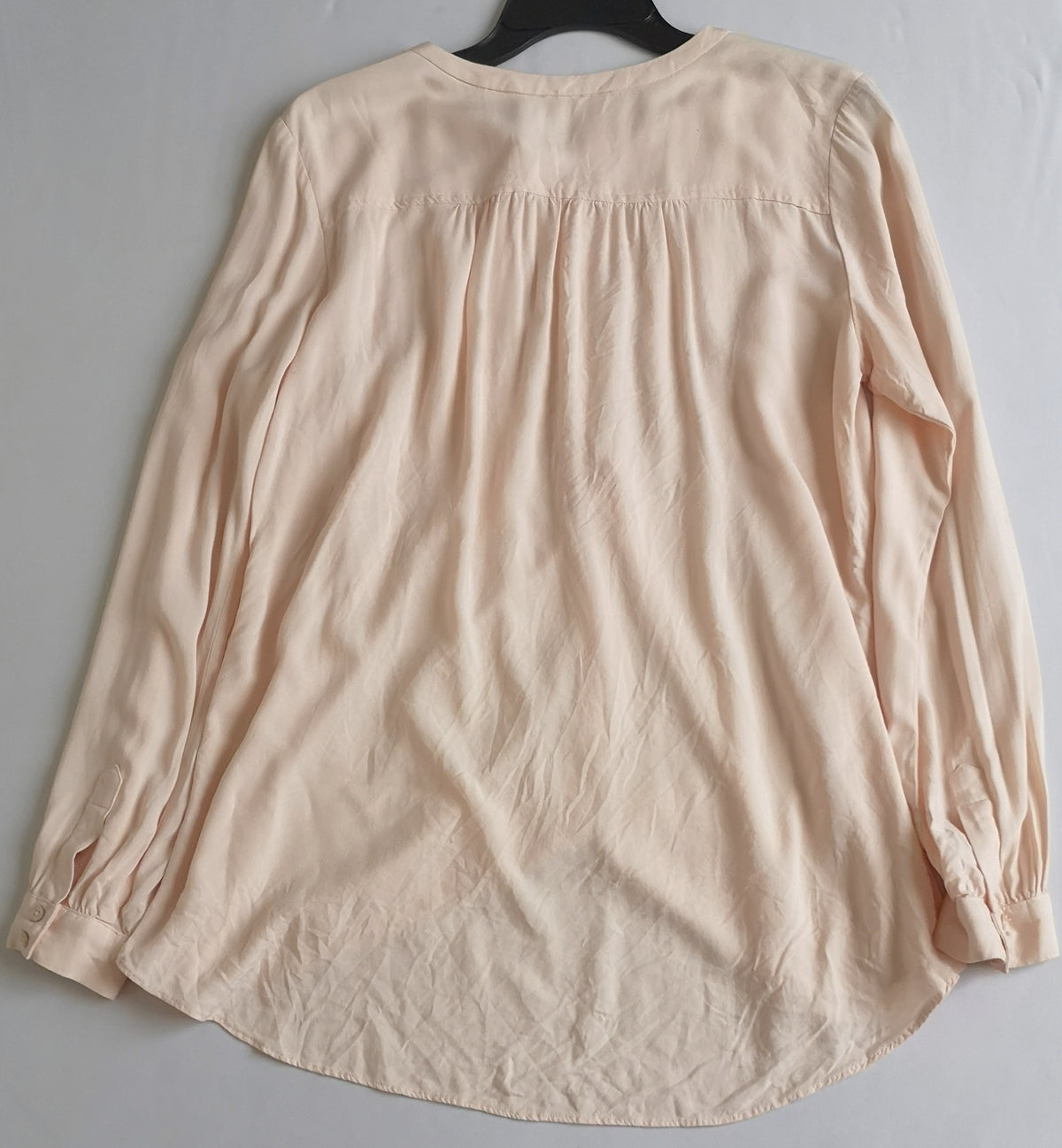 Blusa cuello redondo incluye cartera