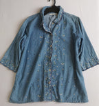 Blusa bordada incluye cartera