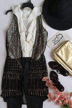 Chaleco tipo boho y blusa con olanes ⚓
