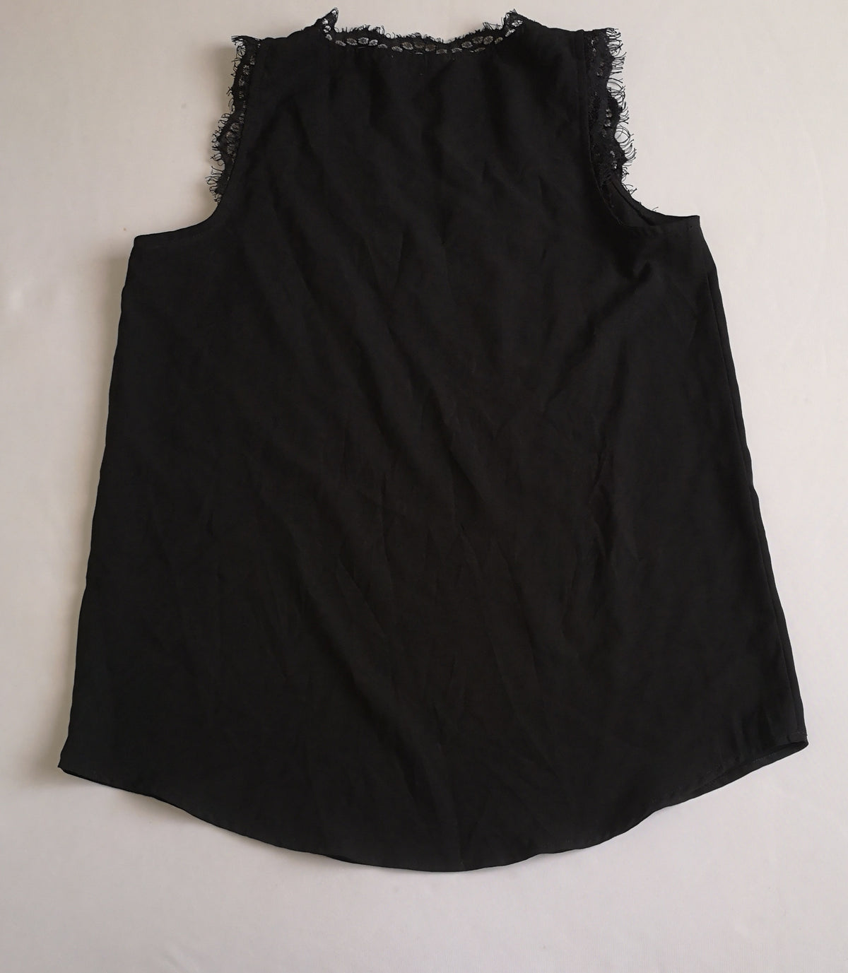 Blusa sin mangas con pantalón corte recto ⚓
