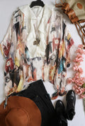 Kimono de seda y blusa con olanes