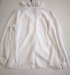 Blusa con olanes y pantalón semiformal